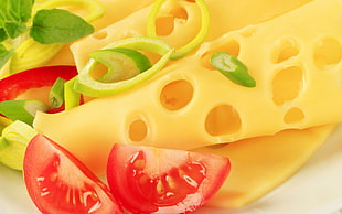 sliced tomatoes and cheese on plate