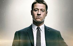 man in black and white suit outfit