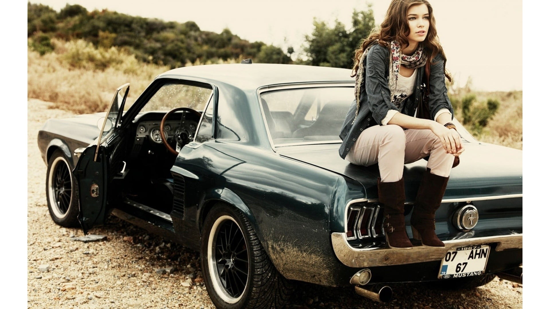 Woman Sitting In Black Ford Mustang Fastback Hd Wallpaper Wallpaper Flare