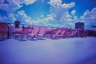 red and pink folding chairs, infrared, depth of field