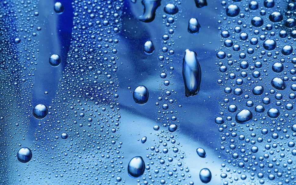Water drops on glass panel HD wallpaper