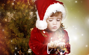 child wearing Santa Claus costume HD wallpaper