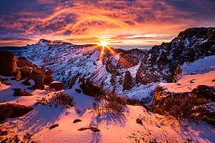 snowy mountain during golden hour HD wallpaper