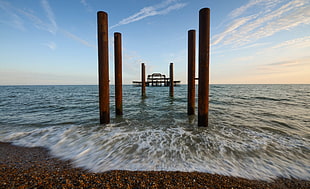 landscape and wide-angle photograph of wooden dock frame