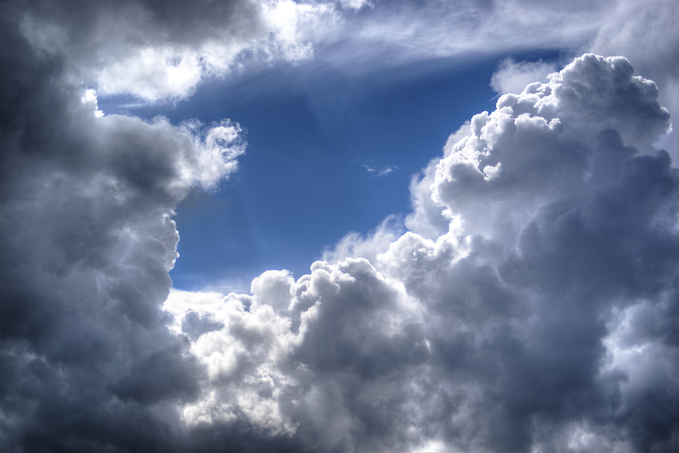 low angle photo of gray clouds during daytime HD wallpaper