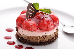closeup photo of chocolate cake with cherry toppings