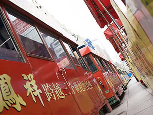 close up photo of red trams