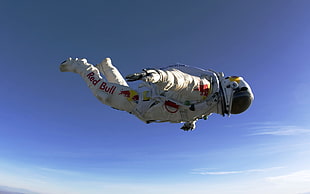man wearing astronaut suit, Red Bull