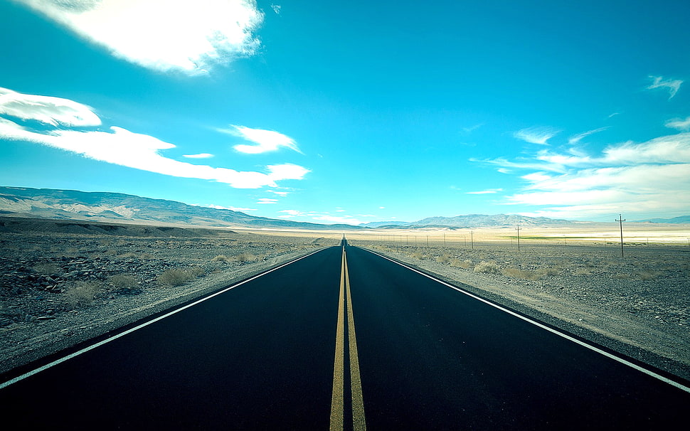 black concrete road at daytime HD wallpaper