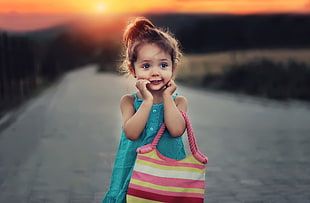 girl wearing teal dress holding handbag HD wallpaper