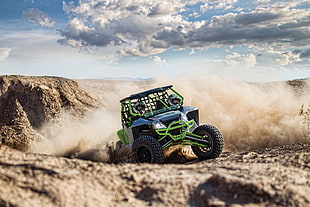 time lapse photography of men riding monster truck on field
