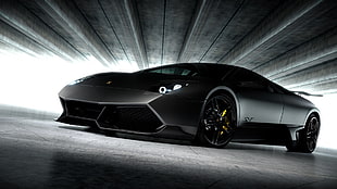 black Lamborghini Huracan sports coupe HD wallpaper