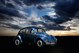 time lapse photography of blue Volkswagen Beetle under the sky