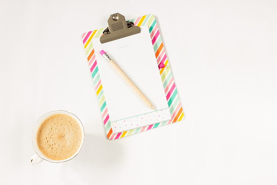pencil on paper board beside mug HD wallpaper