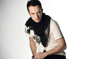 man in white shirt and black scarf photograph