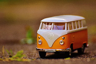 orange and white Volkswagen bus toy
