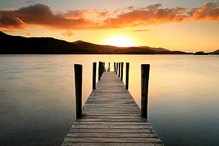 dock on body of water during the horizon, derwentwater