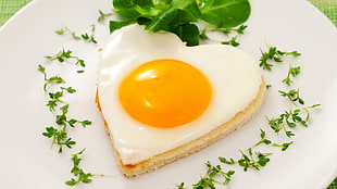 heart shaped sunny side-up egg on bread