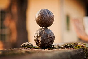 two stacks of round gray stones HD wallpaper