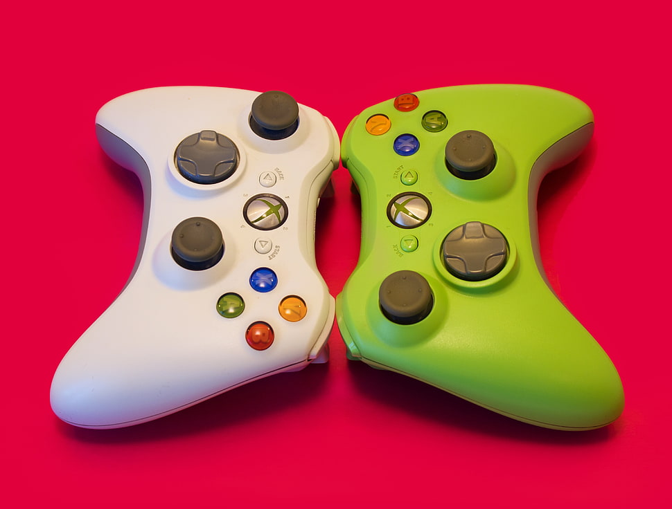 white and green Xbox 360 game controllers HD wallpaper