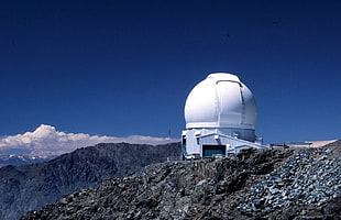 white and black concrete house, observatory, landscape