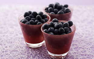blueberries on red glass cup