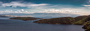 bird's eye view of landscape body of water surrounded of mountains, croatian