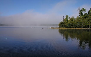 photograph of calm lake at daytime
