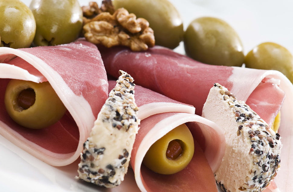 bacon roll strips with olive inside HD wallpaper