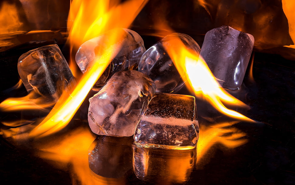 stones with flames HD wallpaper