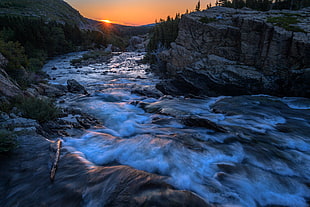 river between rocky mountain during golden hour, swiftcurrent, montana HD wallpaper