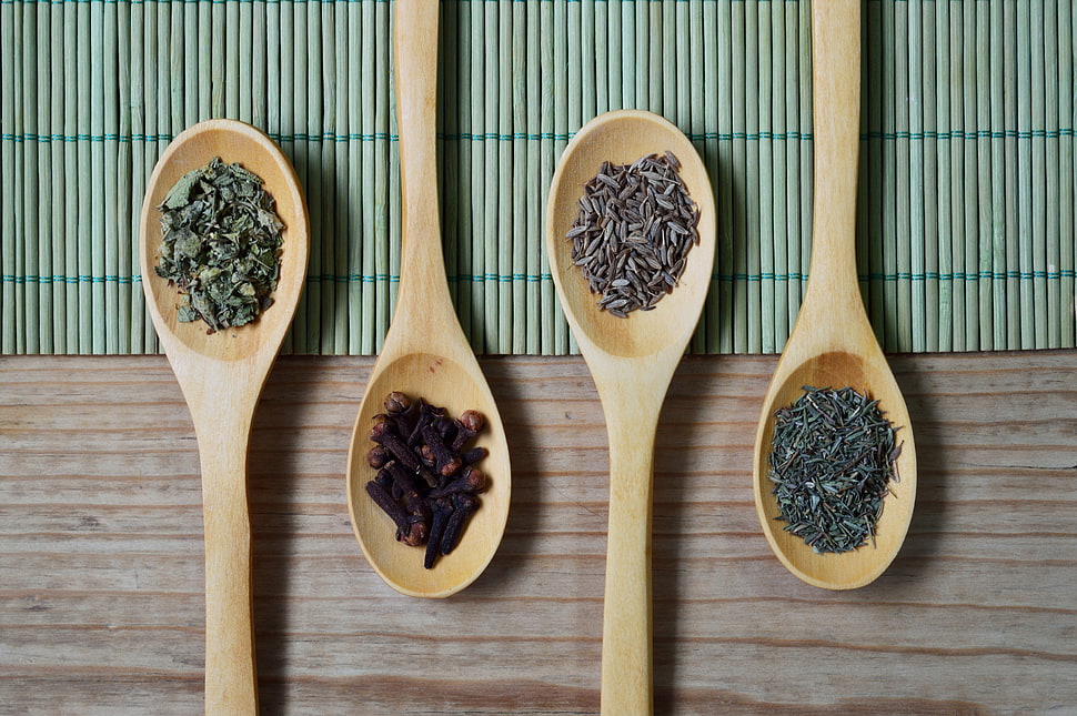four brown wooden spoons HD wallpaper