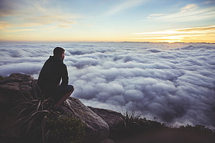 man in black jacket on top of mountain HD wallpaper