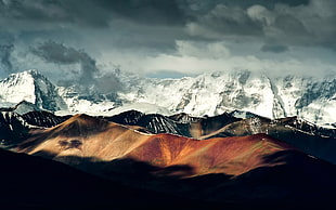 areal view of white,black,and brown mountains