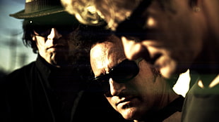 three men wearing sunglasses