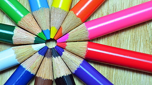 assorted-color pencil lot on brown surface HD wallpaper