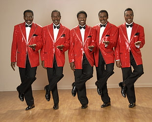 five men in red blazer and black pants