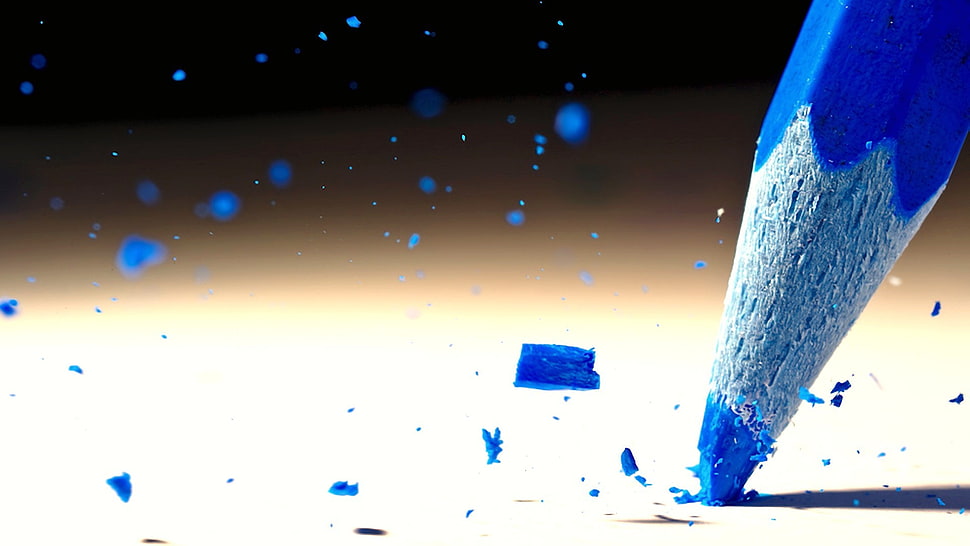 macro shot photography of blue color pencil on white surface HD wallpaper