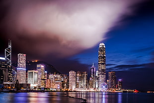 night view photography of high-rise buildings beside body of water, hong kong HD wallpaper
