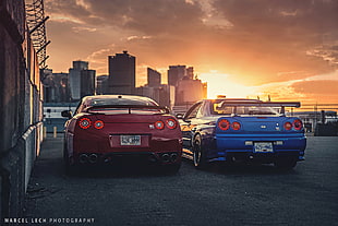 two blue and red sports cars
