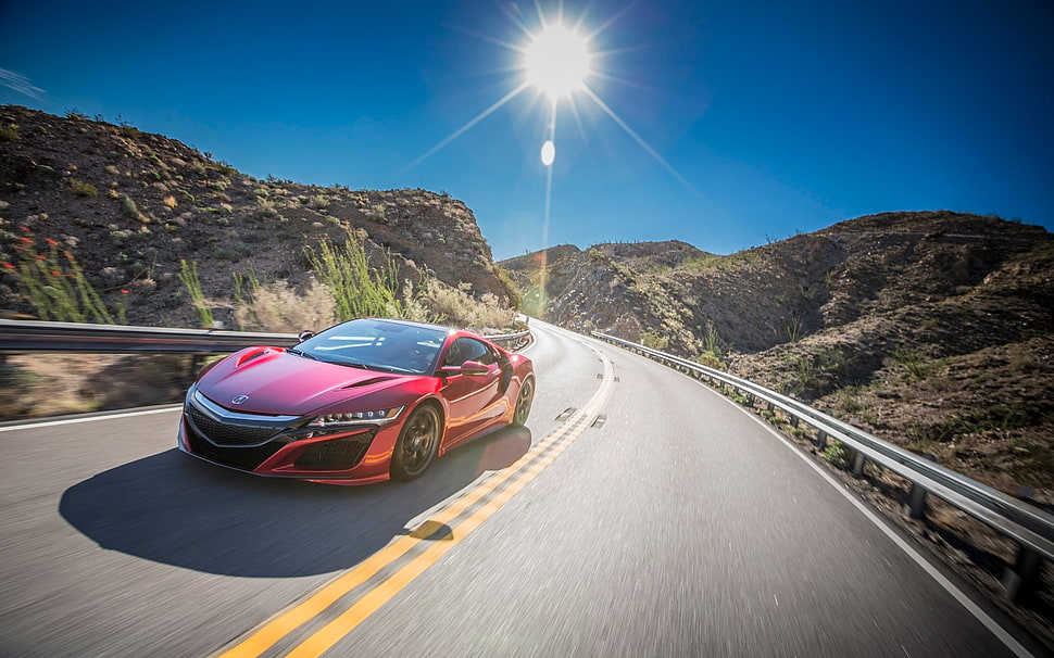 red sports coupe on road during daytime HD wallpaper