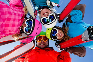 low angle photography of people wearing snow safety gears