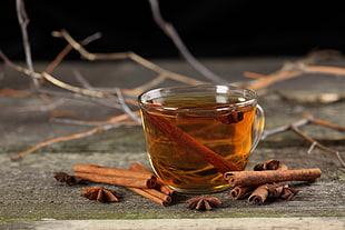 shallow focus of honey in clear glass cup