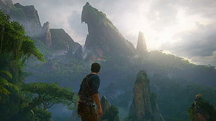 man standing near rock cliff wallpaper, Uncharted 4: A Thief's End, Nathan Drake, video games, mountains