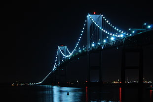 lighted suspension bridge, cityscape, bridge