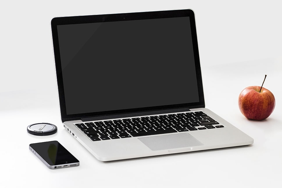 MacBook Pro beside Apple fruit and space gray iPhone 6 HD wallpaper