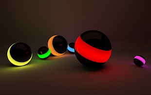round black and assorted colored LED light on white surface