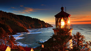 lighthouse near ocean during golden hour, sunset, lighthouse, cliff, landscape