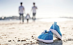 pair of blue low-top sneakers, shoes, beach