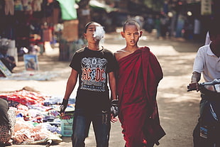 boy's red apparel, children, monks, Burma, smoking